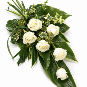 Rose funeral sheaf Malta — white roses with ivy, steel grass and tropical foliage